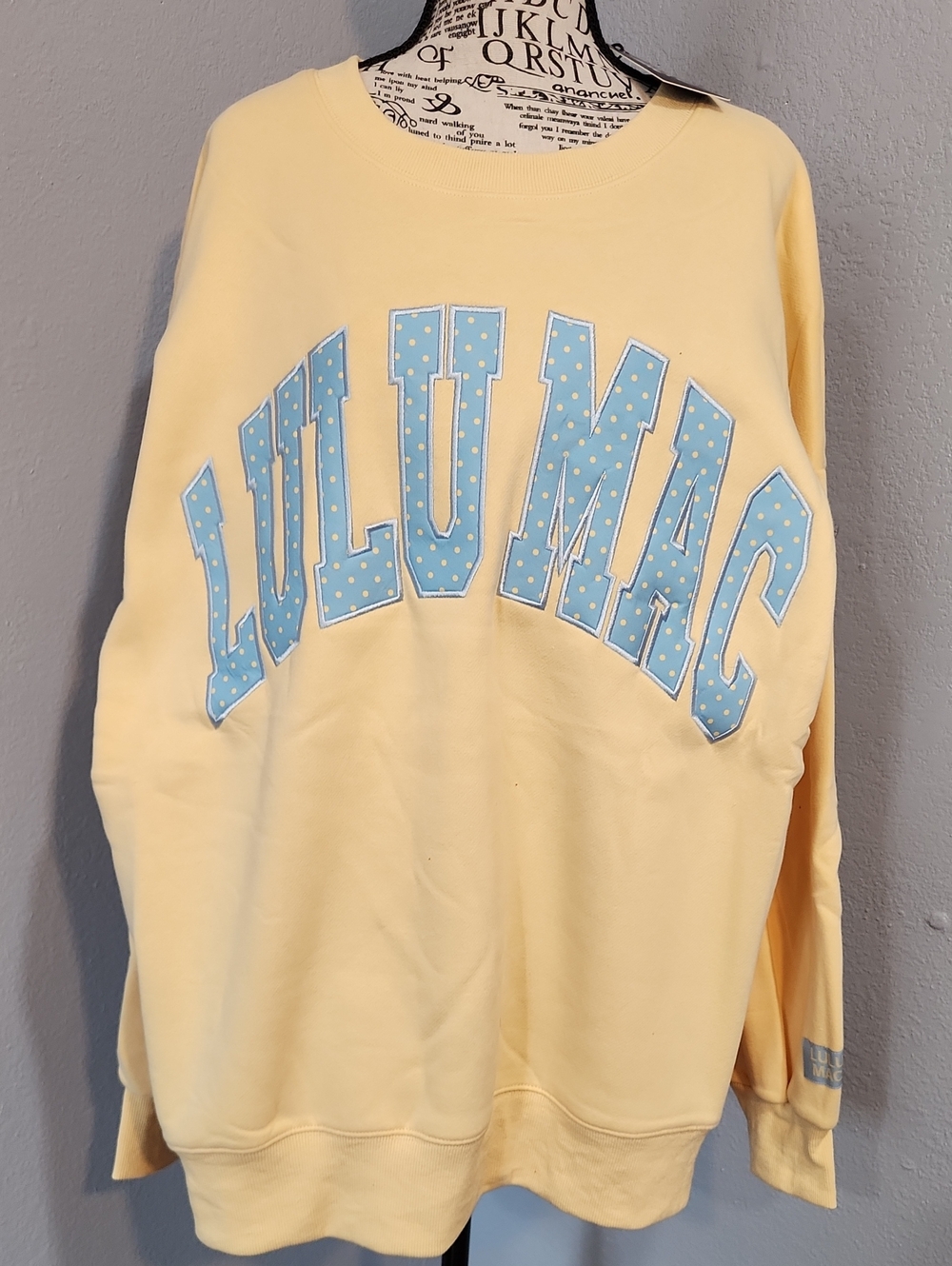 Lulu Mac Yellow Sweatshirt with Light Blue/ Yellow Polka Dot Lettering.